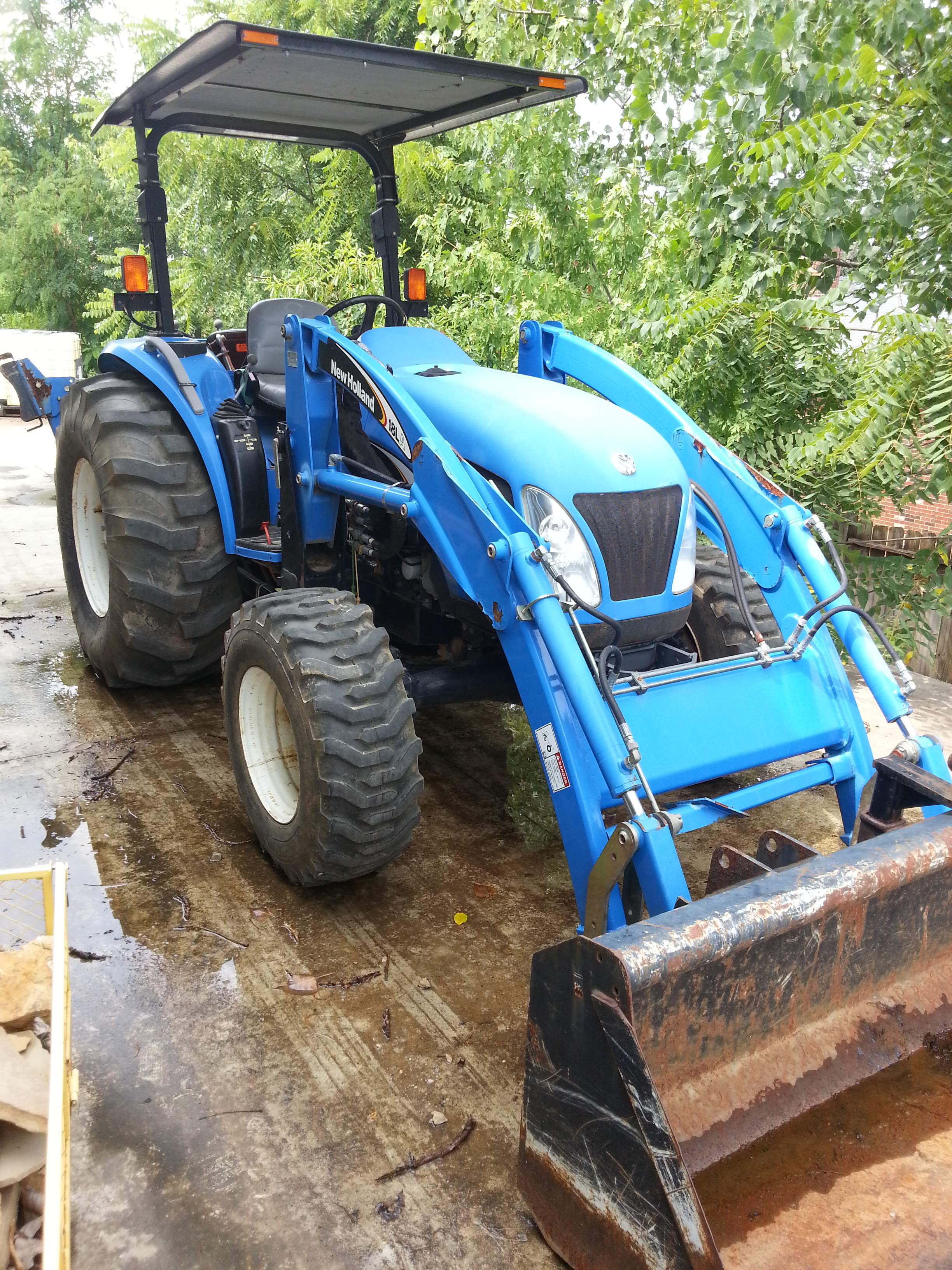 New Holland 18LA Tractor w\Backhoe ane more