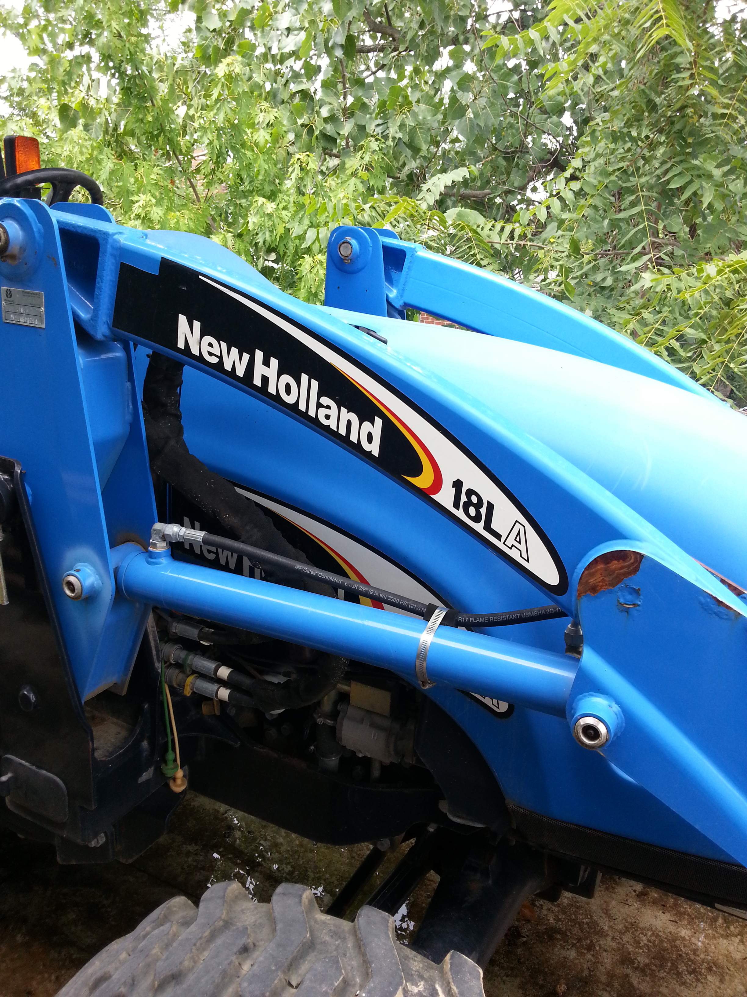 New Holland 18LA Tractor w\Backhoe ane more